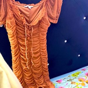 Brownish dress can medium to large